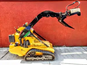 Mini Beak skid steer attachment for demolition and material handling