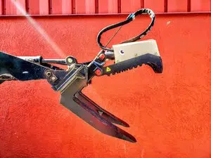 Mini Beak skid steer attachment for demolition and material handling