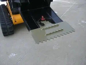 Mini Beak skid steer attachment for demolition and material handling